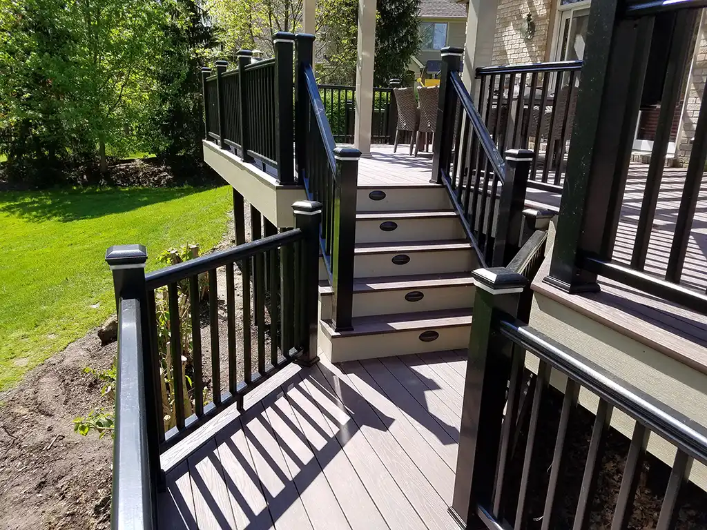 Deck with multi-levels and deck stairs with recessed lights.